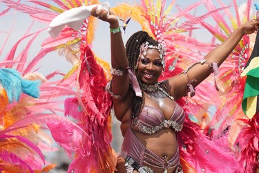 A reveller takes part in the Toronto Caribbean Carnival.