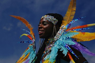A reveller takes part in the Toronto Caribbean Carnival.