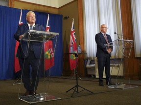 Ontario Premier Doug Ford (left), and Minister of Municipal Affairs and Housing Steve Clark (right), speak to the media during a press conference following the release of the Auditor General’s Special Report on Changes to the Greenbelt, at Queens Park, in Toronto, Wednesday, Aug. 9, 2023.