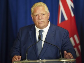 Ontario Premier Doug Ford speaks to the media during a press conference following the release of the Auditor General’s Special Report on Changes to the Greenbelt, at Queens Park