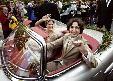 Justin Trudeau, son of the late Prime Minister Pierre Trudeau, leaves with his new bride Sophie Gregoire in his father's 1959 Mercedes 300 SEL after their marriage ceremony in Montreal Saturday, May 28, 2005.(CP PHOTO/Ryan Remiorz)