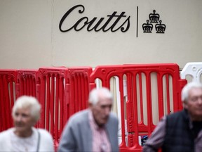 People walk past the headquarters of the private bank Coutts, in London, on July 28, 2023.