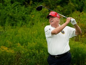 Former U.S. president and 2024 Presidential hopeful Donald Trump plays golf during the Official Pro-Am Tournament ahead of the LIV Golf Invitational Series event at Trump National Golf Club Bedminster in Bedminster, N.J., on Aug. 10, 2023