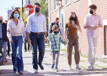 Liberal leader Justin Trudeau arrives to cast his ballot in the 44th general federal election as he's joined by wife Sophie Gregoire-Trudeau, and children, Xavier, Ella-Grace and Hadrien in his riding of Papineau, Montreal on Monday, Sept. 20, 2021. THE CANADIAN PRESS/Paul Chiasson