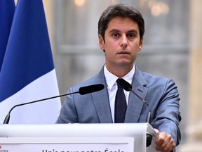 French Education and Youth Minister Gabriel Attal holds a press conference ahead of the first day of school, in Paris, Monday, Aug. 28, 2023.