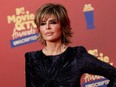 Lisa Rinna posing on red carpet.