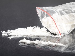 sprinkled white amphetamine powder, concept snuff drug addiction