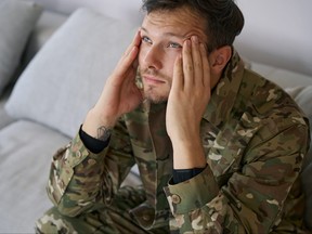 Military serviceman at home