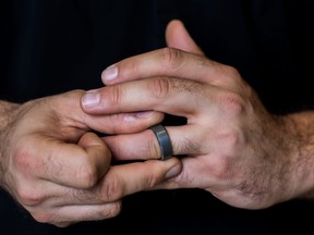 Hands Fidgeting with a Wedding Ring