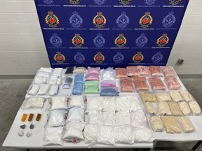 Hamilton Police display the drugs seized following an investigation into a clandestine fentanyl operation.