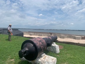 A U.S. Park Service ranger overlooks Fort Sumter towards Charleston where the first shots of the Civil War were fired in 1861. (LANCE HORNBY/Postmedia Network)