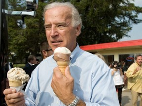 Then-U.S. vice presidential nominee Senator Joe Biden enjoys ice cream as he spoke with local residents at the Windmill Ice Cream Shop in Aliquippa, Pa., Aug. 29, 2008.