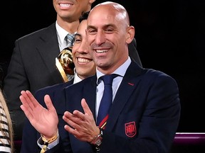 President of the Royal Spanish Football Federation Luis Rubiales reacts on the podium at the end of the Australia and New Zealand 2023 Women's World Cup final football match between Spain and England at Stadium Australia in Sydney on Aug. 20, 2023.