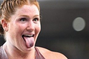 Sarah Mitton celebrates after winning silver in the women’s shot put at the World Athletics Championships. GETTY IMAGES