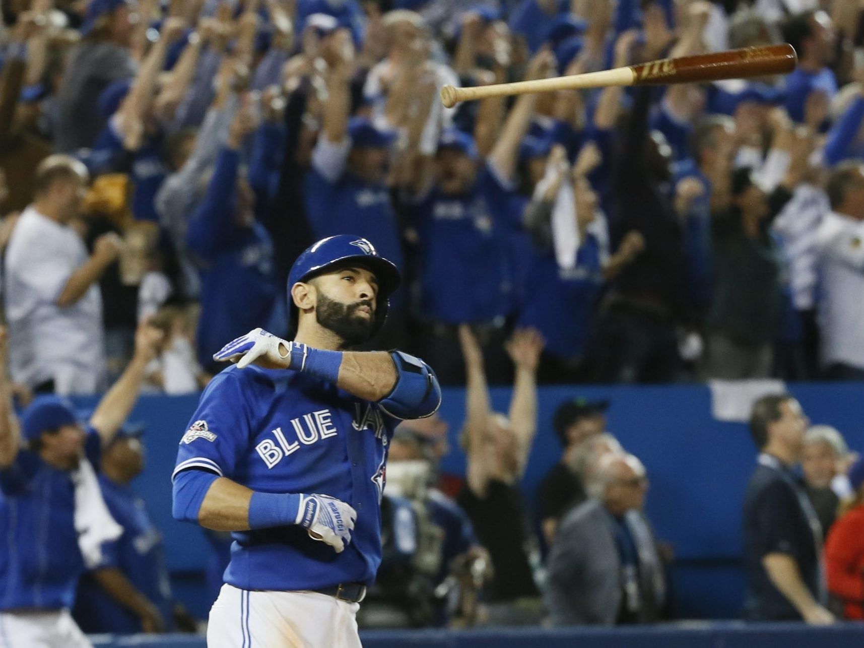 The Toronto Blue Jays' Jose Bautista rounds the bases after