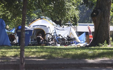A massive homeless encampment at Allan Gardens includes too many tents and structures to count.