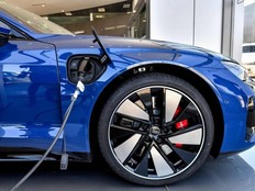 An electric vehicle is connected to a charging point