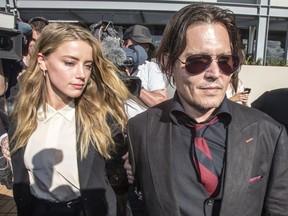 Johnny Depp and his then wife Amber Heard leave The Southport Court