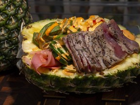 The Big Kahuna, with seared ahi tuna on a bed of rice with many toppings, was among the food offerings previewed during CNE media preview day in Toronto on Wednesday, Aug. 16, 2023. This dish is made by Eat My Bowls and is available in the Food Buiding.