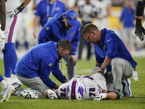 Buffalo Bills offensive tackle Tommy Doyle (72) lays on the field after an injury in the second half of an NFL preseason football game against the Pittsburgh Steelers, in Pittsburgh, Saturday, Aug. 19, 2023.