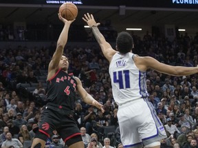Toronto Raptors forward Scottie Barnes (4) shoots over Sacramento Kings forward Trey Lyles (41) during the first quarter of an NBA basketball game in Sacramento, Calif., Wednesday, Jan. 25, 2023. Vancouver and Montreal will be hosting NBA pre-season games come October in the ninth NBA Canada Series.The Raptors will be taking on the Sacramento at Vancouver's Rogers Arena on Oct. 8.