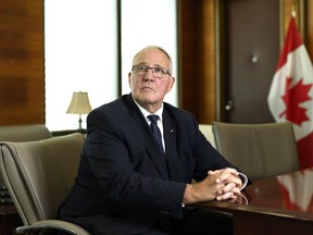 National Defence Minister Bill Blair is shown in his office.