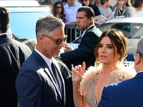 Sandra Bullock and Bryan Randall - Getty