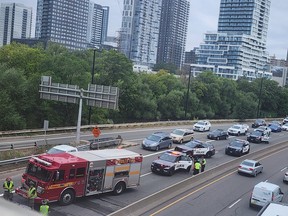 Fire truck, police car at scene of accident on highway