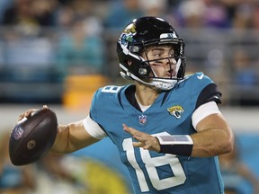 Jacksonville Jaguars quarterback Nathan Rourke (18) in action during an NFL pre-season football game against the Miami Dolphins, on August 26, 2023, in Jacksonville, Fla.