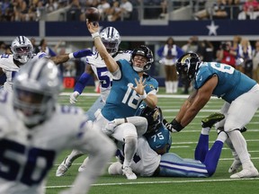 A video of a touchdown from ex-B. C. Lion Nathan Rourke went viral last week as he suited up in his first pre-season game for the Jacksonville Jaguars. Rourke (18) throws a touchdown pass during an NFL Football game in Arlington, Texas, Saturday, Aug. 12, 2023.