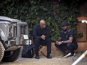 This image released by Sony Pictures Entertainment shows Denzel Washington, left, and director Antoine Fuqua on the set of "The Equalizer 3."