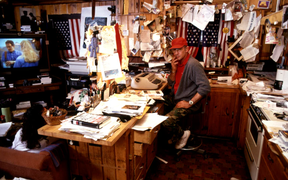 Hunter S. Thompson sits in his kitchen, which he also used as an office. (Paul Harris/Getty Images)