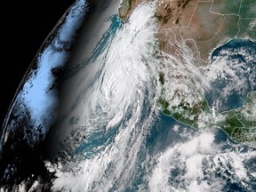 This image obtained from the National Oceanic and Atmospheric Administration (NOAA), shows Hurricane Hilary off the coast of Mexico on Aug. 19, 2023, at 14:40:20UTC.