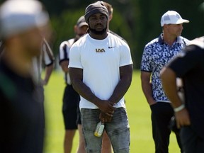 FILE - Dalvin Cook watches a New York Jets practice session at the NFL football team's training facility in Florham Park, N.J., July 30, 2023. A person with knowledge of the deal says the Jets agreed to terms on a one-year contract with former Minnesota Vikings running back Cook on Monday, Aug. 14, 2023, according to a person with knowledge of the deal.