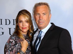 Kevin Costner and Christine Baumgartner are pictured at the Hidden Figures NYC screening in 2016