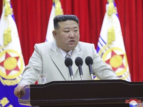 FILE - This photo provided on Tuesday, Aug. 29, 2023, by the North Korean government, North Korean leader Kim Jong Un speaks during his visit to the navy headquarter in North Korea, on Aug. 27, 2023. Independent journalists were not given access to cover the event depicted in this image distributed by the North Korean government. The content of this image is as provided and cannot be independently verified. Korean language watermark on image as provided by source reads: "KCNA" which is the abbreviation for Korean Central News Agency.