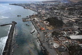 An aerial image taken on Aug. 10, 2023 shows destroyed homes and buildings burned to the ground in the historic Lahaina in the aftermath of wildfires in western Maui in Lahaina, Hawaii.