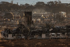 Burned houses and buildings are pictured in the aftermath of a wildfire, is seen in Lahaina, western Maui, Hawaii on Aug. 12, 2023.