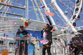 CNE CEO Darrell Brown and special guest, drag queen star Tynomi Banks in front of the CNE’s new Superwheel during the CNE media day in Toronto on Wednesday, Aug. 16, 2023. ERNEST DOROSZUK/TORONTO SUN