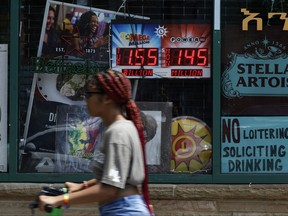 An electronic sign advertises the Mega Millions and Power Ball jackpot amounts outside a convenience store on Aug. 7, 2023 in Silver Spring, Md.