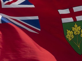 The Ontario English Catholic Teachers' Association says it has been bargaining with the provincial government for more than a year in the hopes of landing a fair deal, but the province is not meaningfully engaging in discussions about funding public education. Ontario's provincial flag flies on a flag pole in Ottawa, Tuesday June 30, 2020.