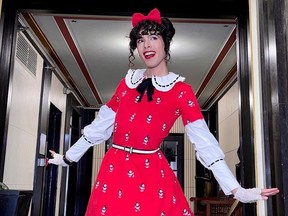 Man dressed as Minnie Mouse