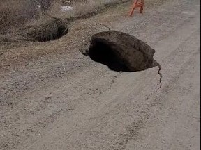 The OPP posted this image of a monster sinkhole on Hwy. 400, near Bradford to X.