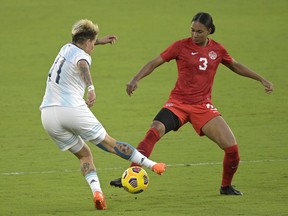 Argentina forward Yamila Rodriguez (11) and Canada defender Jade Rose (3) compete for a ball during the first half of a SheBelieves Cup women's soccer match, Sunday, Feb. 21, 2021, in Orlando, Fla. Canadians Rose, Maya Antoine and Mya Jones are among the the 56 women named to the to the 2023 Hermann Trophy watch list.THE CANADIAN PRESS/AP/Phelan M. Ebenhack