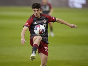 Toronto FC's Alonso Coello controls the ball during first half MLS soccer action against the New England Revolution in Toronto on Saturday May 6, 2023. Coello said his team has kept its focus on snapping their lengthy winless streak rather than reports that Canadian men's national team John Herdman is in talks to take over the struggling Major League Soccer club.