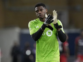Toronto FC goalkeeper Sean Johnson applauds the fans following Canadian Championship quarterfinal soccer action against CF Montreal in Toronto on Tuesday, May 9, 2023. Toronto FC's nightmarish season took another turn for the worse Wednesday with news that Johnson will be out four to six weeks with a broken hand.