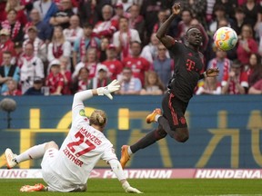 FILE - Bayern's Sadio Mane, right, scores a goal that was disallowed for offside during the German Bundesliga soccer match between 1. FSV Mainz 05 and FC Bayern Munich at the Mewa Arena in Mainz, Germany, Saturday, April 22, 2023. Bayern Munich's president has confirmed that the club is aware of "initial talks" around a reported move for forward Sadio Mané from the German champion to Saudi Arabian club Al-Nassr. Bayern president Herbert Hainer says the club has been informed about the situation.
