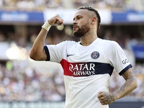 PSG's Neymar celebrates after scoring the first goal during a friendly soccer match against Jeonbuk Hyundai Motors in Busan, South Korea, Thursday, Aug. 3, 2023.