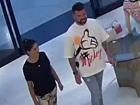 photo of two suspects wanted for theft