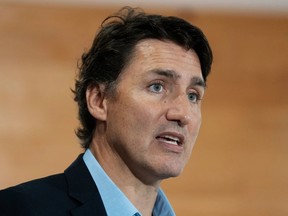 Prime Minister Justin Trudeau speaks to reporters in Cornwall, P.E.I., Monday, Aug. 21, 2023.